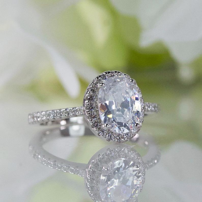 1 CT Oval Cut White Diamond Halo Bridal Ring Set White Gold Over On 925 Sterling Silver