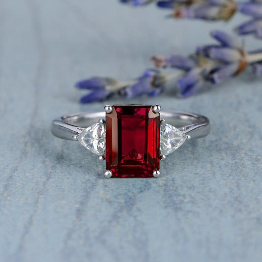 2.00 Ct Emerald Cut Red Garnet & Trillion Cut White CZ Three-Stone Promise Ring In 925 Sterling Silver