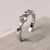 1.20 CT Round Cut Aquamarine & Round CZ Three-Stone Promise Ring In 925 Sterling Silver