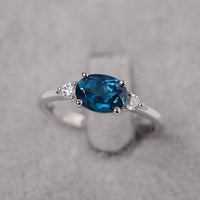 1.20 Ct Oval Cut London Blue Topaz 925 Sterling Silver Three-Stone Engagement Ring