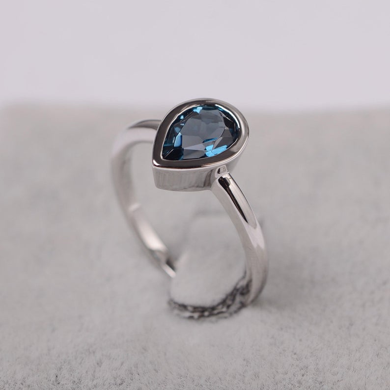 1.00 Ct Pear Cut London Blue Topaz 925 Sterling Silver Bezel Set December Birthstone Ring