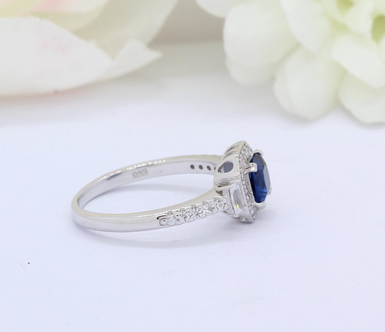 1 CT Cushion Cut Blue Sapphire & Round Baguette CZ Halo Engagement Ring