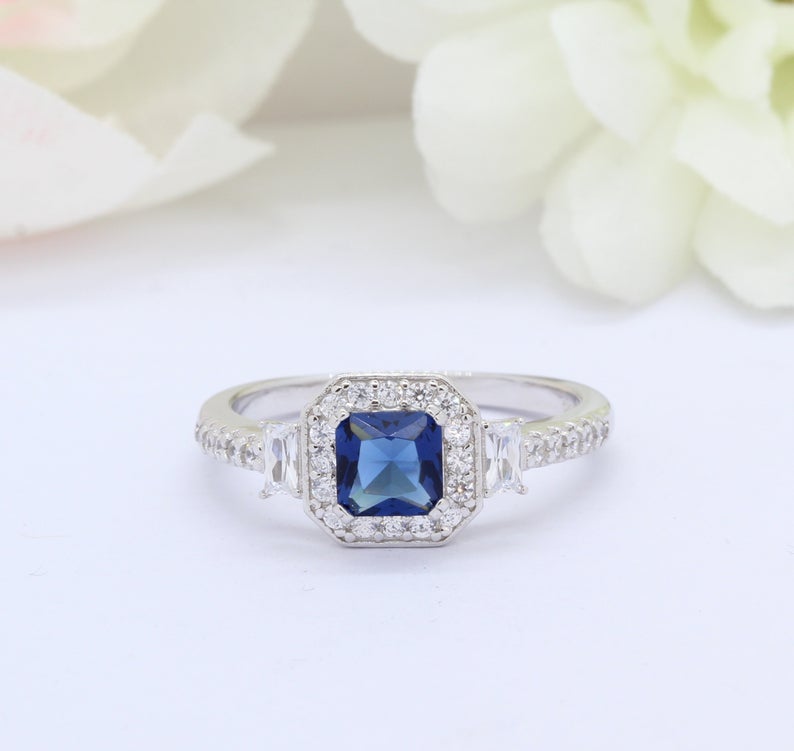 1 CT Cushion Cut Blue Sapphire & Round Baguette CZ Halo Engagement Ring