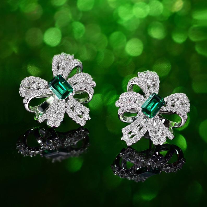 3.75 Ct Emerald Cut Green Emerald & Round CZ Party Wear Bow Earrings In 925 Sterling Silver