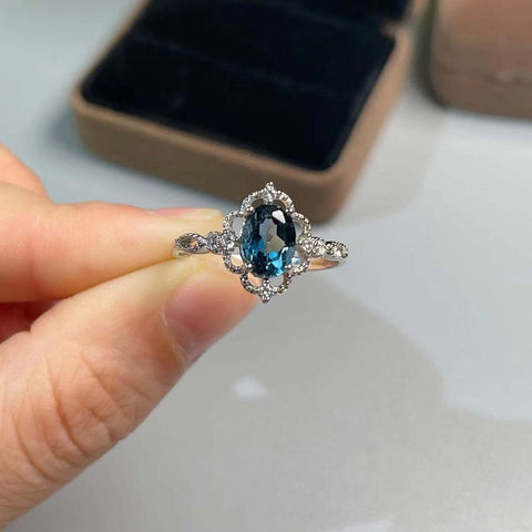 1.50 Ct Oval Cut London Blue Topaz 925 Sterling Silver Floral Engagement Ring