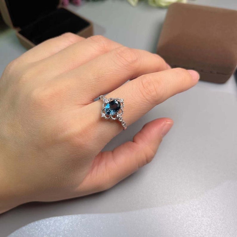 1.50 Ct Oval Cut London Blue Topaz 925 Sterling Silver Floral Engagement Ring