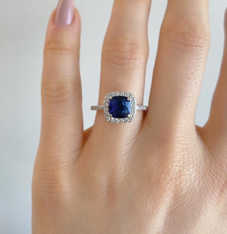 Cushion Cut Blue Sapphire and Half-Moon Diamond Three Stone at Susannah  Lovis Jewellers