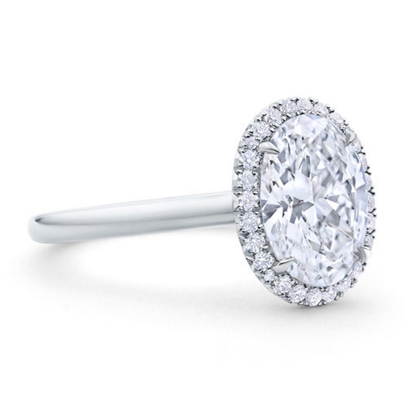2 CT Oval Cut White Diamond White Gold Over On 925 Sterling Silver Halo Engagement Ring For Womans
