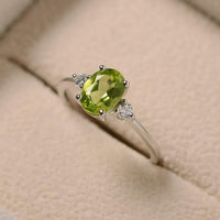 1.20 Ct Oval Cut Green Peridot & Round Cz 925 Sterling Silver Three-Stone Promise Ring