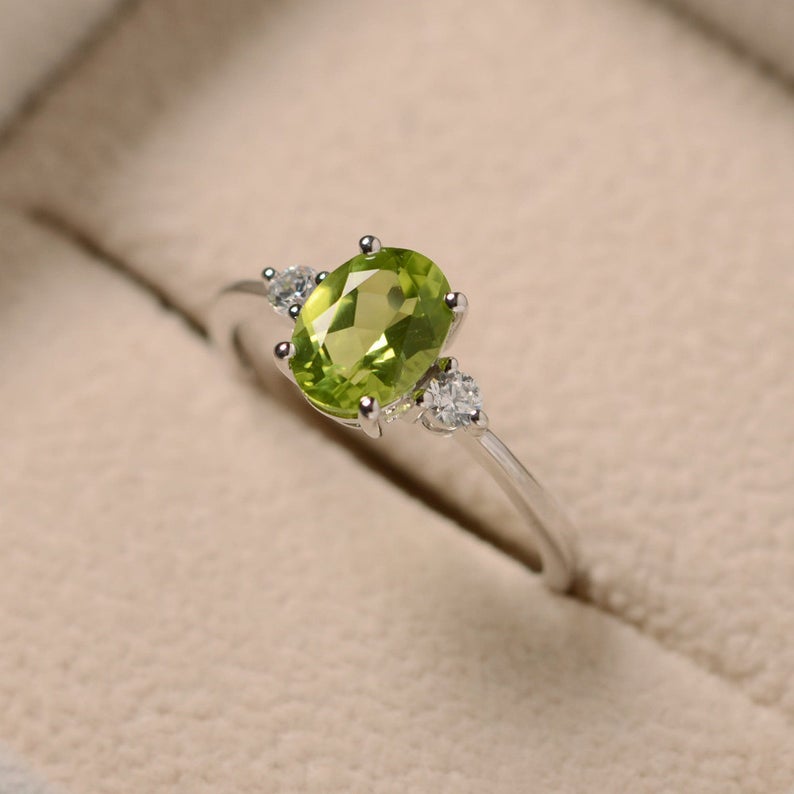 1.20 Ct Oval Cut Green Peridot & CZ Three-Stone Promise Ring In 925 Sterling Silver - atjewels.in
