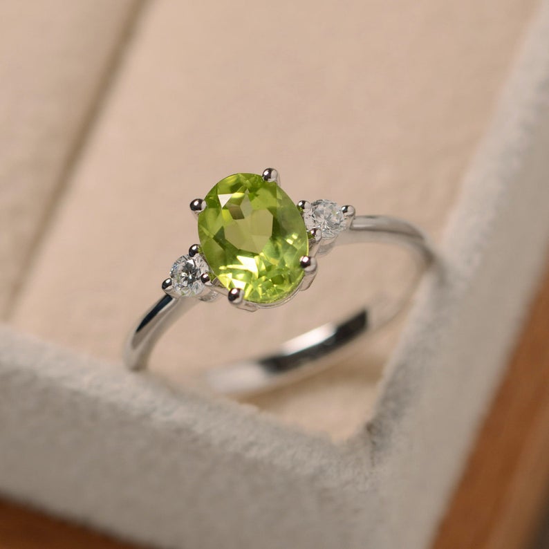 1.20 Ct Oval Cut Green Peridot & CZ Three-Stone Promise Ring In 925 Sterling Silver - atjewels.in