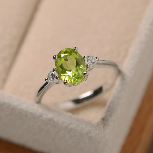 1.20 Ct Oval Cut Green Peridot & CZ Three-Stone Promise Ring In 925 Sterling Silver - atjewels.in