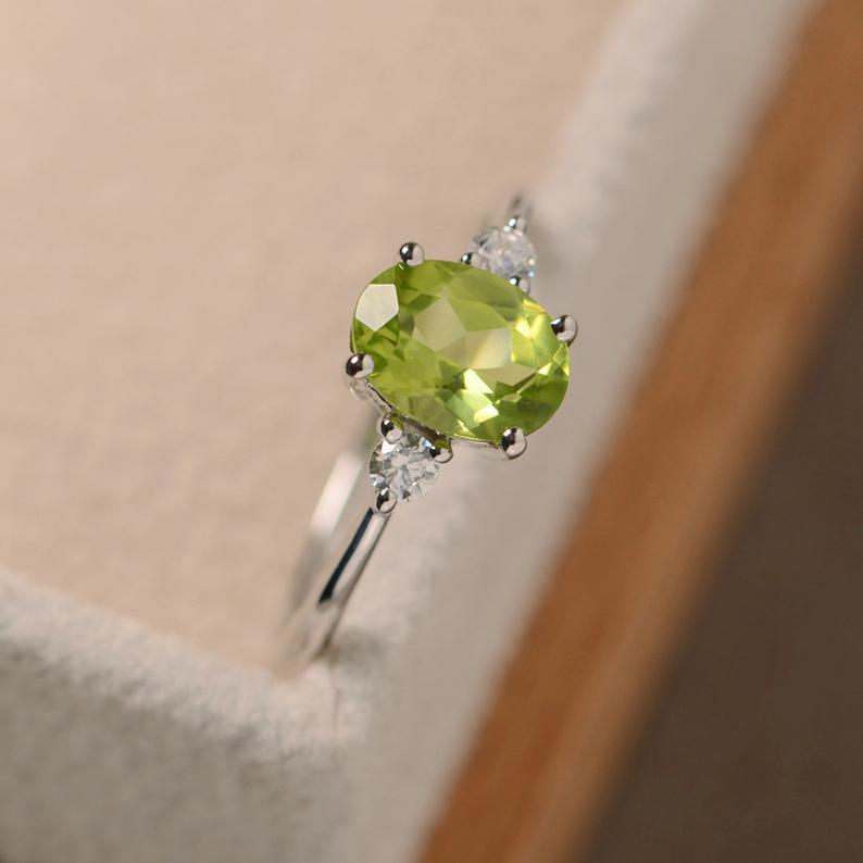 1.20 Ct Oval Cut Green Peridot & Round Cz 925 Sterling Silver Three-Stone Promise Ring