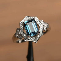 4.00 Ct Emerald Cut London Blue Topaz 925 Sterling Silver Halo Engagement Ring