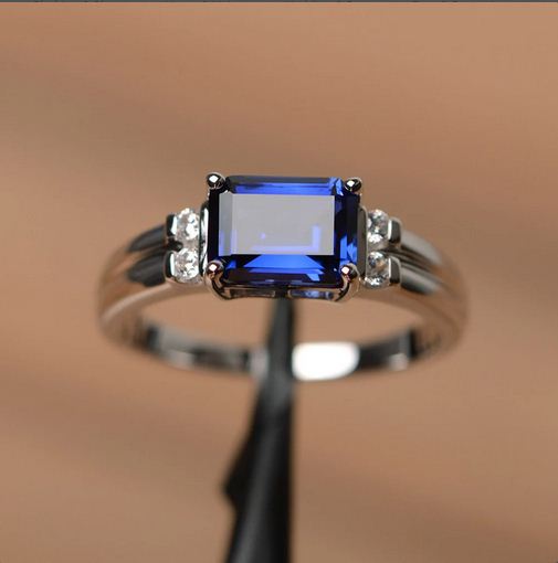 1.50 Ct Emerald Cut Blue Sapphire Solitaire W/Accents Engagement Ring 925 Sterling Silver